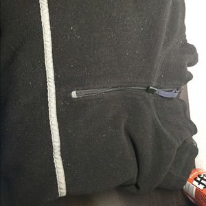 Black fleece with a grey stripe